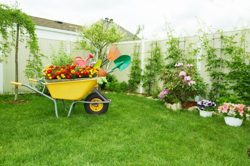 Inspector assessing plants during a garden maintenance review